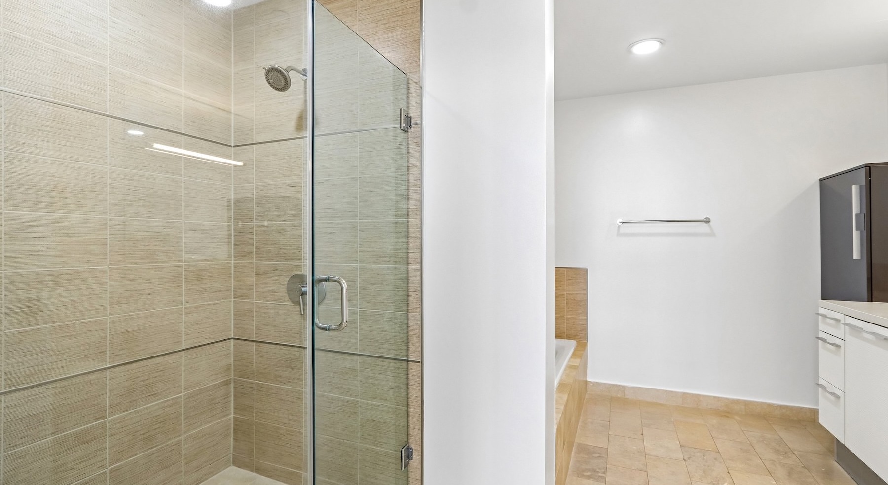 a bathroom with a glass shower