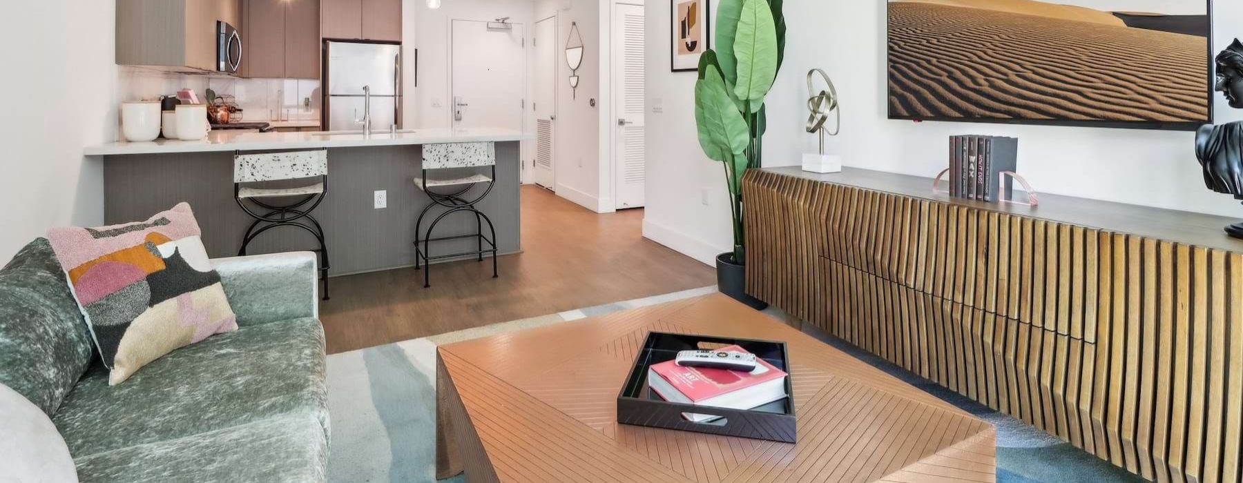 a living room with a couch and a table