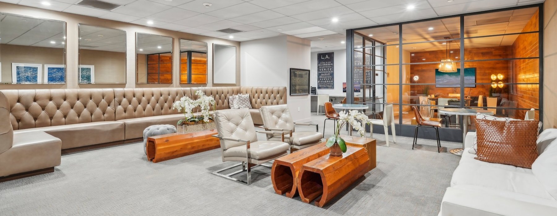 a room with couches and chairs