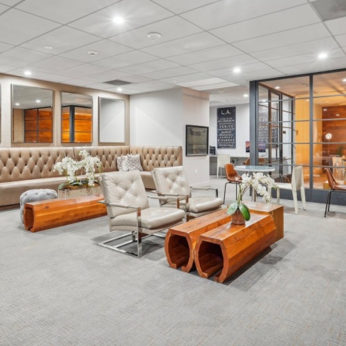 a room with couches and chairs